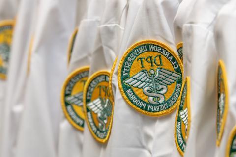 White coats with esball国际平台客户端 DPT Emblem